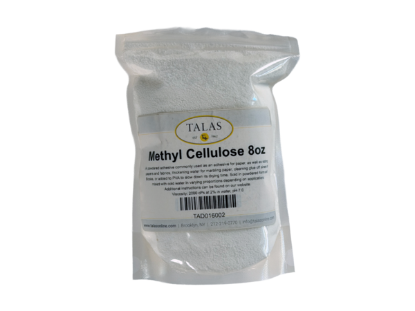 Methyl cellulose adhesive.