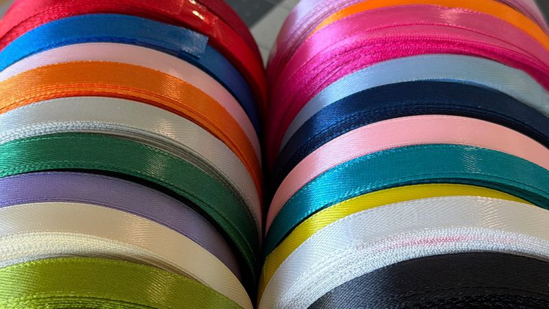Rolls of colored ribbon markers.