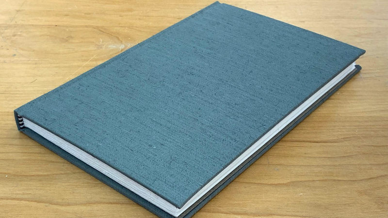 A cloth case-bound book.