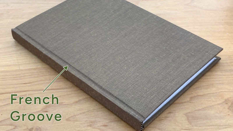 A cloth-bound book showing the french groove along the joint.