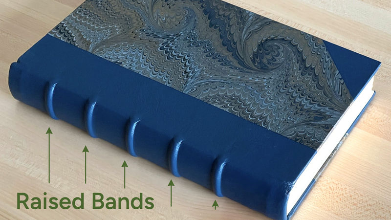 A leather-bound spine with raised bands.