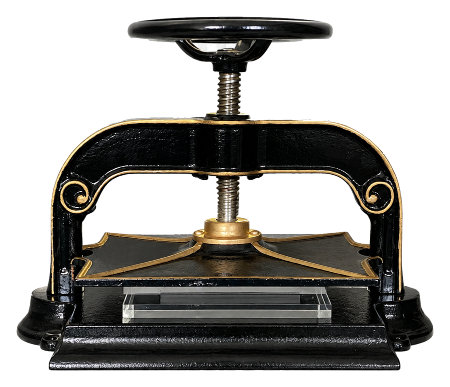 A cast-iron nipping press.