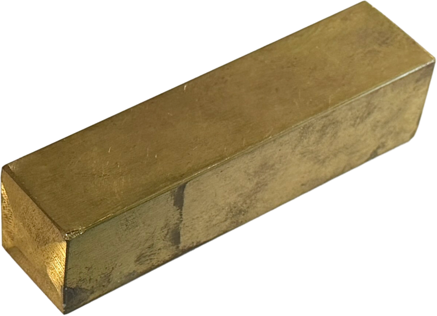 A restored antique cast-iron book press with brass details.